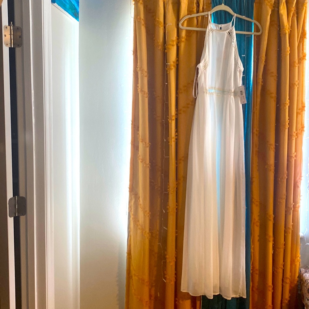 Still tagged, never worn, white, sheer, full length dress